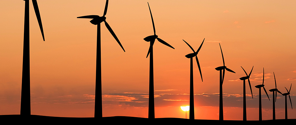 Wind turbines at sunset.